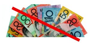 Photograph of Australian money notes with a red line through it.