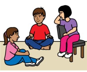 Cartoon drawing of a group of 3 children sitting together. There are 2 females and 1 male.